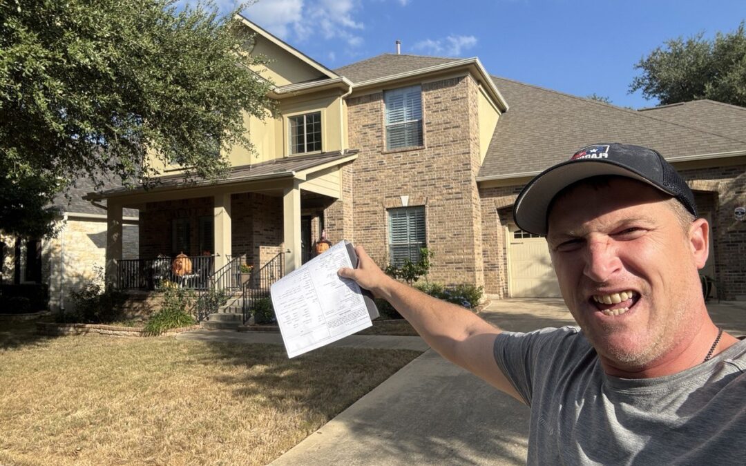 Homeowner cleaning gutters on a Texas home