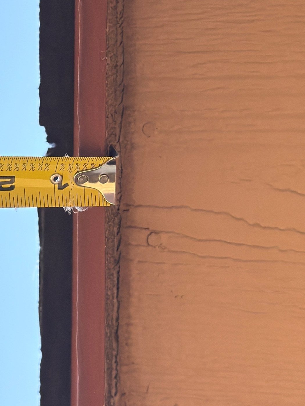 Sales rep presenting roofing options