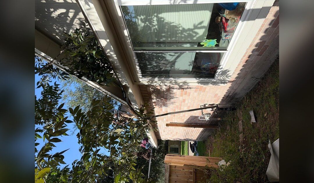 Houston roofing contractor inspecting a roof