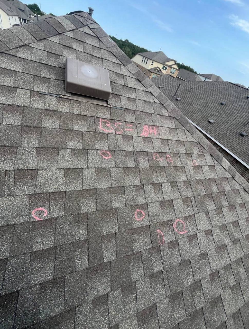 New shingle roof backed by a manufacturer warranty