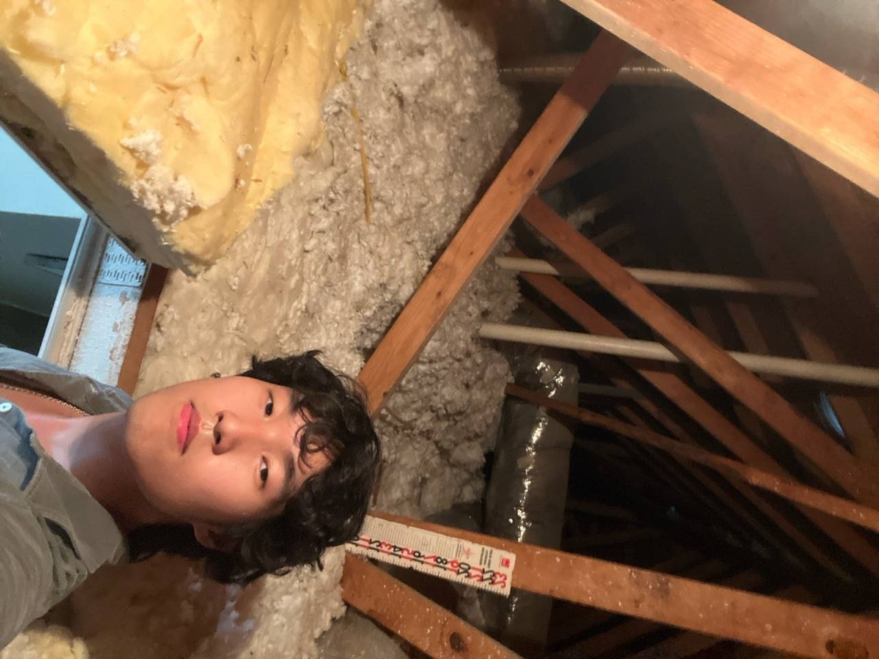 Flagstone Roofing crew reviewing an itemized roof inspection report with a Texas homeowner