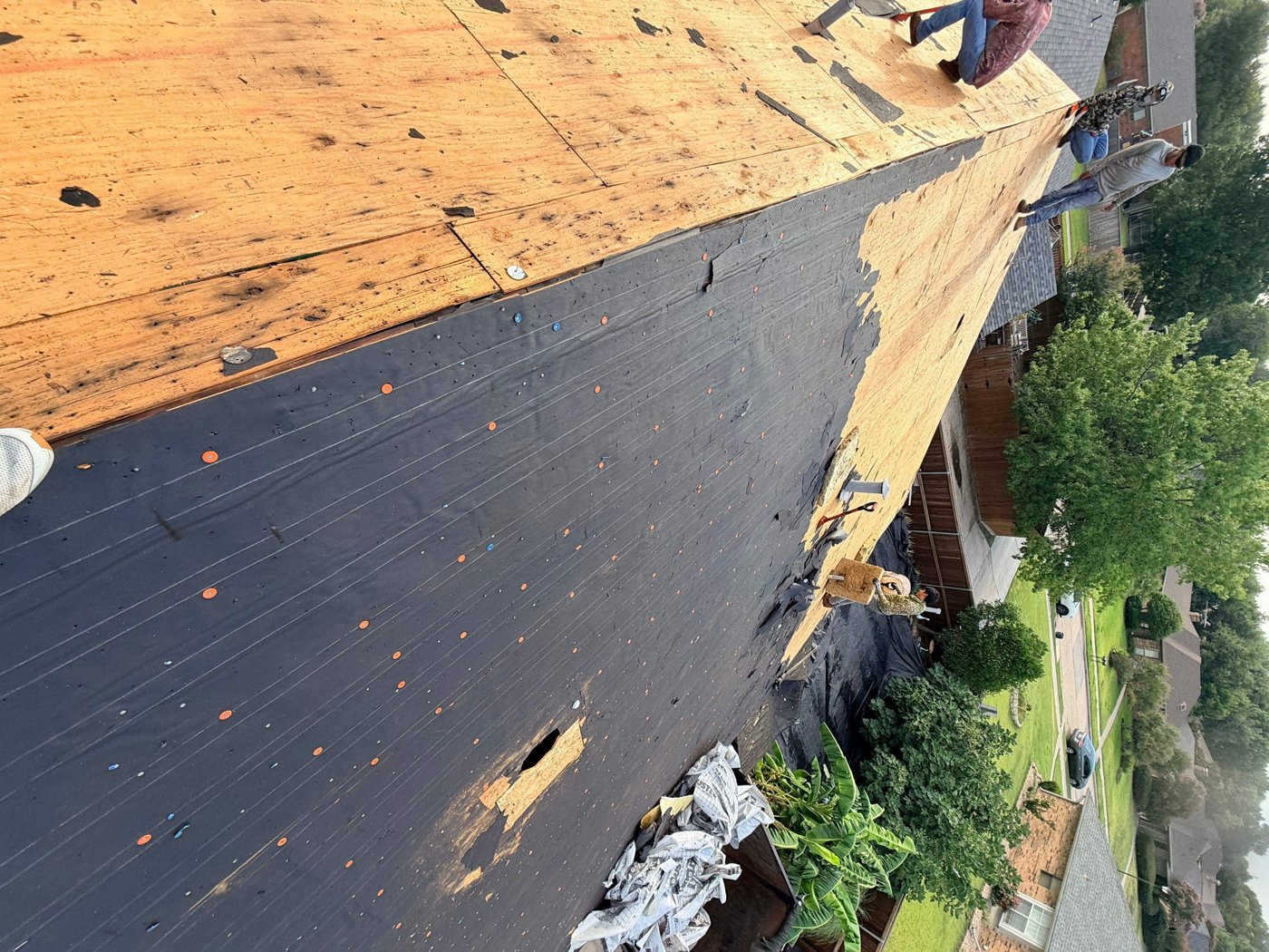 professional roofer inspecting a roof