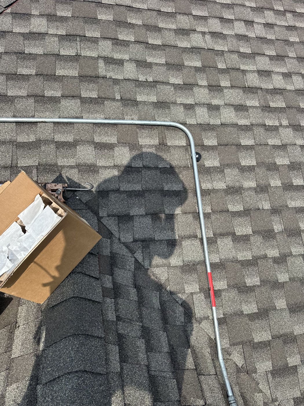Houston roofing contractor inspecting a roof