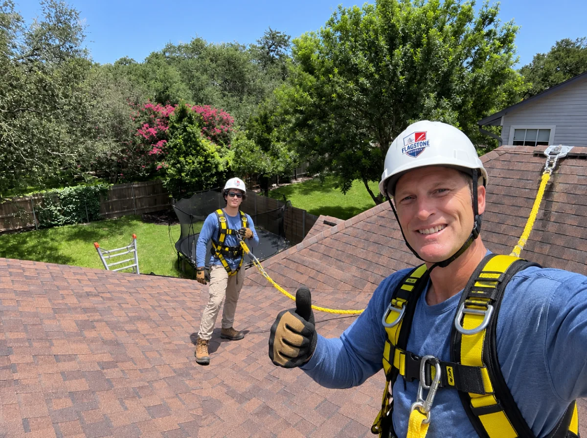 GAF certified roofer reviewing an estimate with a homeowner