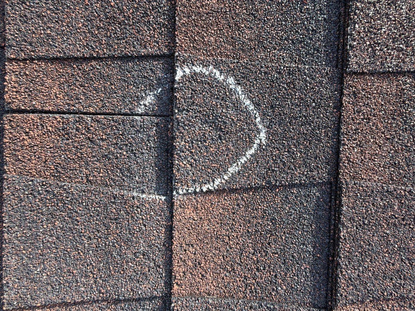 roofing contractor discussing rates with homeowner